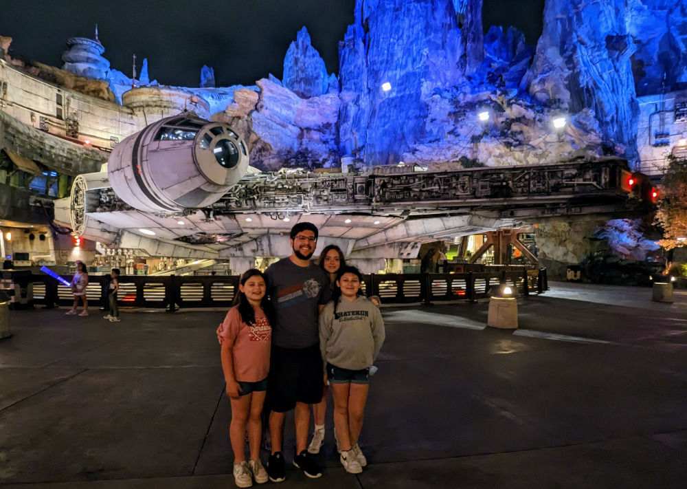 In front of the Millennium Falcon